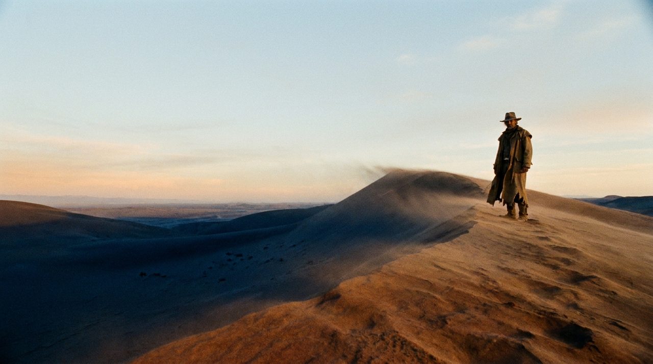 Example result for the prompt: Lone figure on a ridge